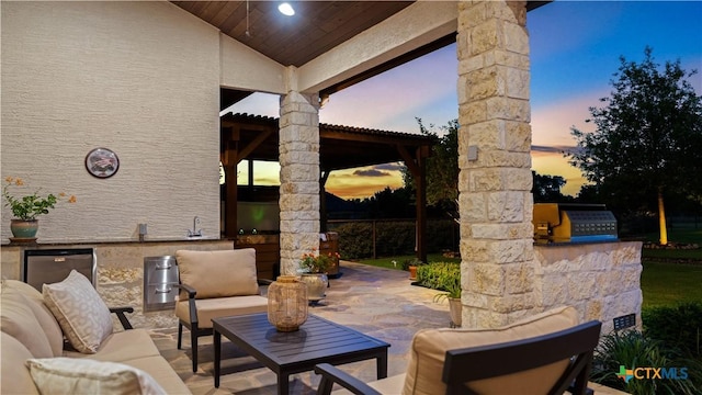 view of patio / terrace with area for grilling and outdoor lounge area