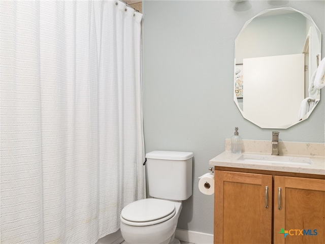 1200 Marcy St, Austin, TX 78745 - bathroom with toilet, vanity, baseboards, and a shower with curtain