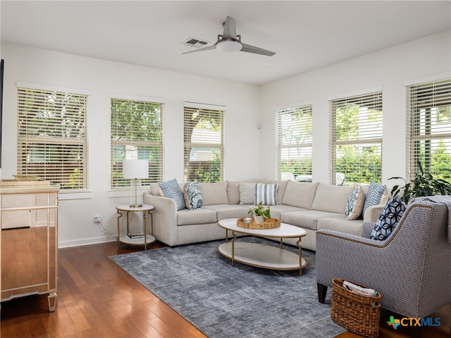 1200 Marcy St, Austin, TX 78745 - living area featuring ceiling fan, wood finished floors, and baseboards