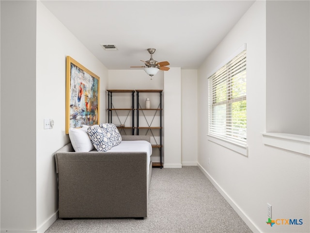 1200 Marcy St, Austin, TX 78745 - sitting room featuring a ceiling fan, baseboards, and carpet