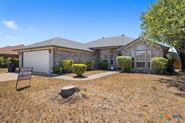 single story home with a garage