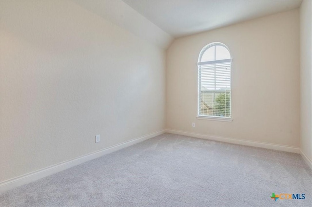 2933 Countryside Path, Seguin, TX 78155 - unfurnished room featuring light colored carpet and lofted ceiling