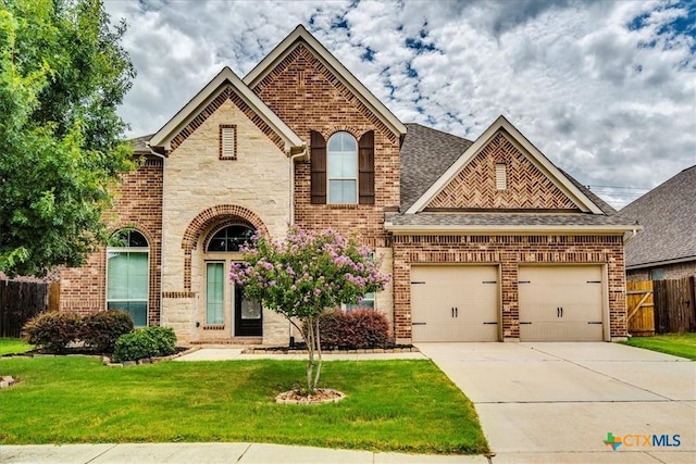 2933 Countryside Path, Seguin, TX 78155 - view of front of house with concrete driveway, roof with shingles, and brick siding