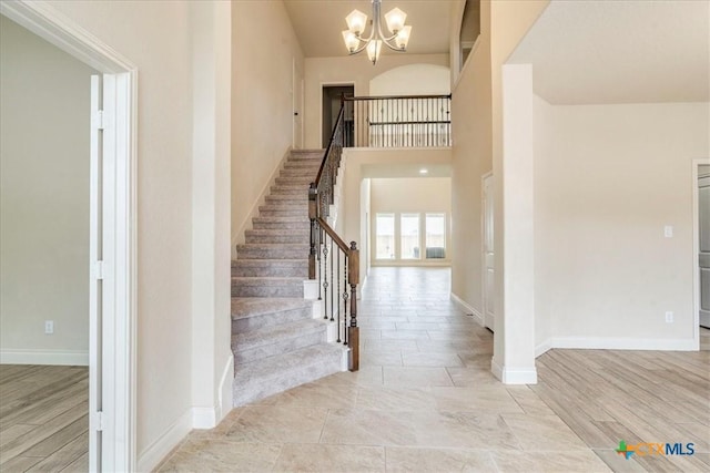2933 Countryside Path, Seguin, TX 78155 - stairs with a chandelier and a towering ceiling