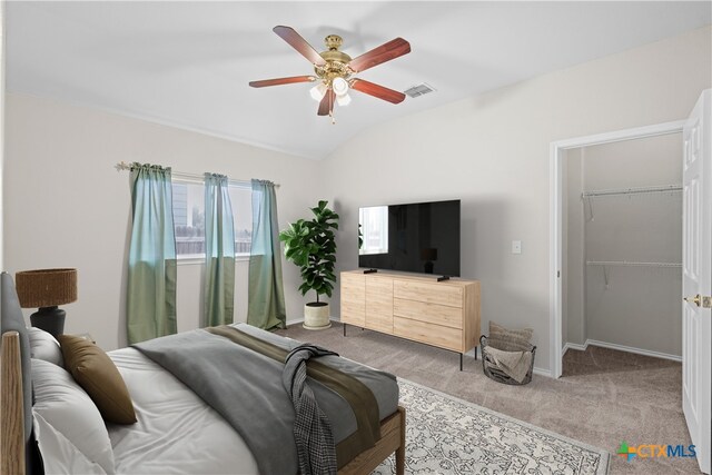 929 Darion St, New Braunfels, TX 78130 - carpeted bedroom featuring lofted ceiling, a ceiling fan, baseboards, visible vents, and a spacious closet