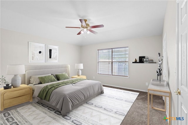 929 Darion St, New Braunfels, TX 78130 - carpeted bedroom featuring ceiling fan and baseboards