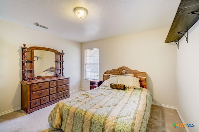 1495 Makinson Rd, La Grange, TX 78963 - carpeted bedroom with baseboards