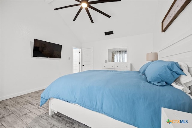1213 Indian Trl, Salado, TX 76571 - bedroom featuring wood finished floors, ceiling fan, and high vaulted ceiling