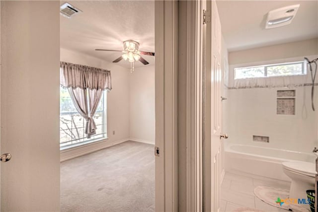 614 Sabine Cir, Temple, TX 76504 - full bathroom featuring toilet, shower / tub combination, ceiling fan, and baseboards