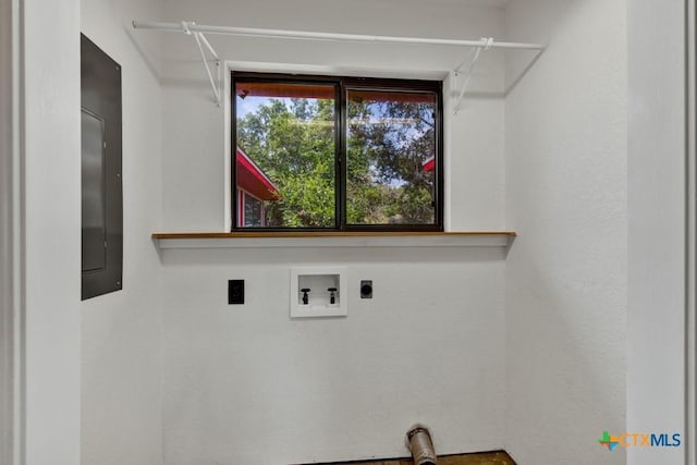 clothes washing area featuring laundry area, hookup for a washing machine, and electric dryer hookup