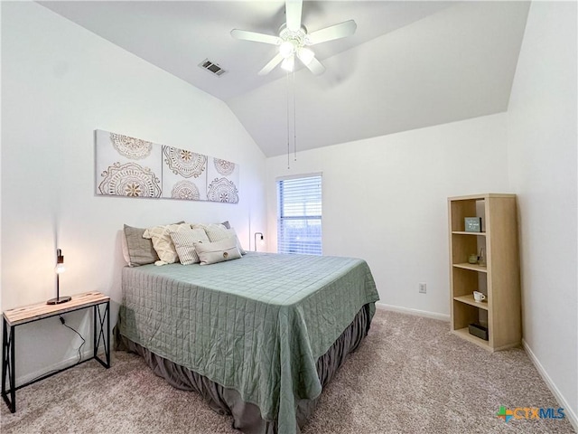 carpeted bedroom with visible vents, ceiling fan, baseboards, and lofted ceiling