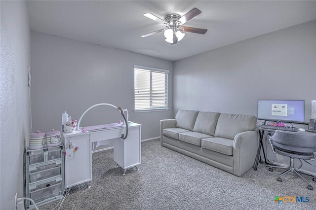 office area featuring ceiling fan and carpet