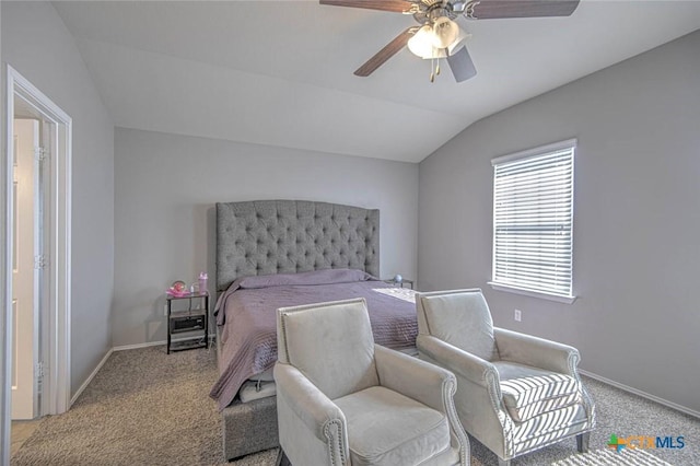 carpeted bedroom featuring lofted ceiling and ceiling fan