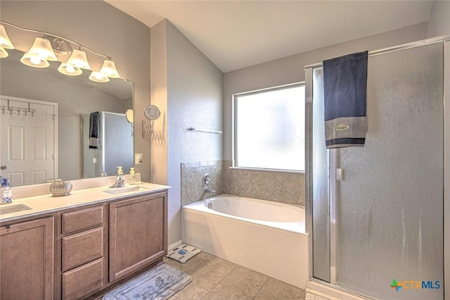 bathroom featuring vanity, tile patterned flooring, and independent shower and bath