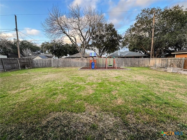 view of yard featuring a playground