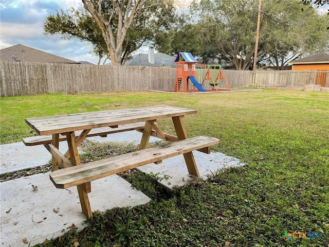 view of yard featuring a playground