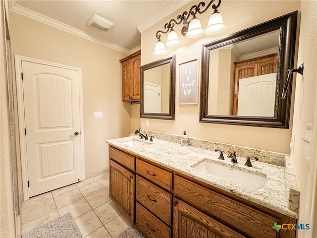 bathroom featuring vanity, crown molding, and tile patterned floors