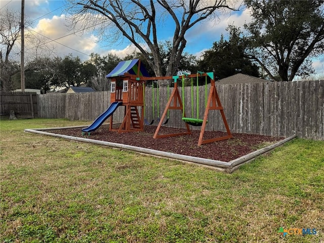 view of playground featuring a yard