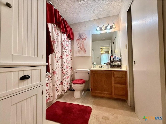 403 Suzie St, Killeen, TX 76542 - full bathroom with a textured ceiling, toilet, vanity, and a shower with curtain