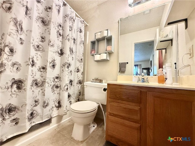 403 Suzie St, Killeen, TX 76542 - bathroom with a textured ceiling, tile patterned flooring, toilet, vanity, and shower / bath combination with curtain
