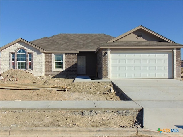 view of front of house with a garage