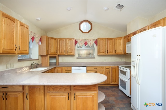 kitchen with kitchen peninsula, lofted ceiling, sink, and white appliances