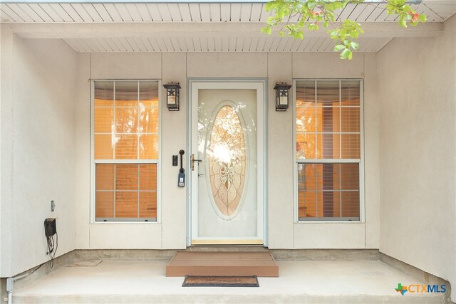 property entrance with a porch