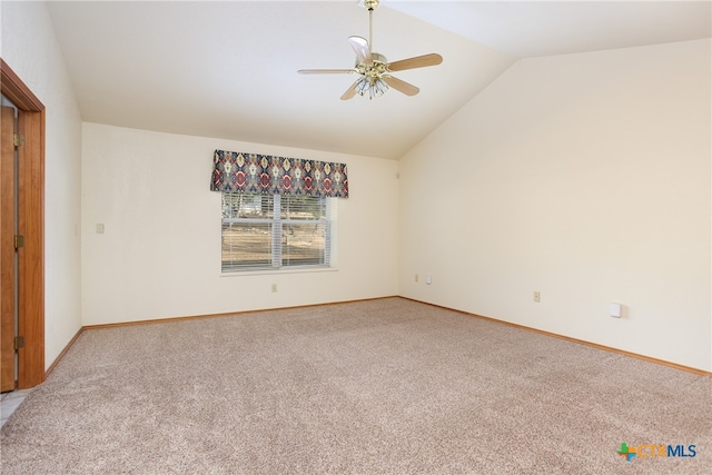 carpeted spare room with high vaulted ceiling and ceiling fan