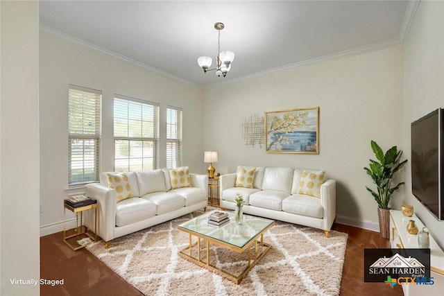 living room with an inviting chandelier and ornamental molding