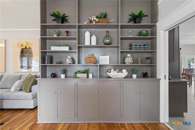 interior details with built in features and wood finished floors