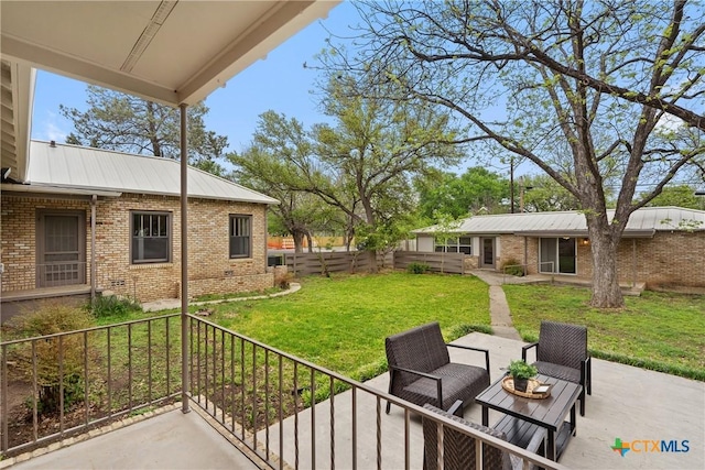 view of patio / terrace with fence