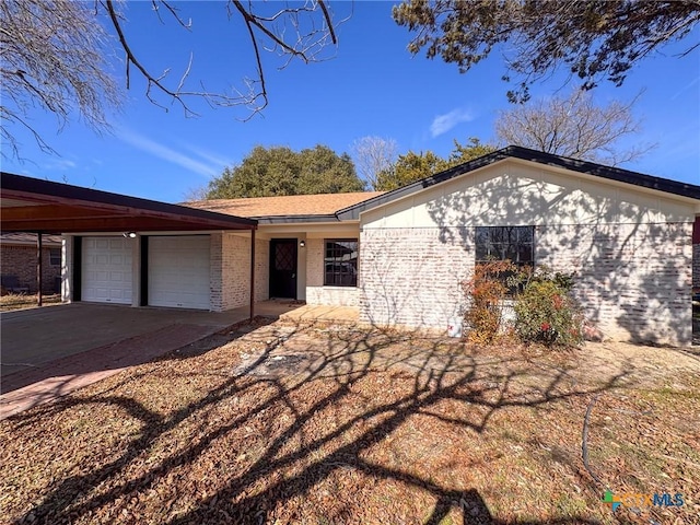 single story home with a garage