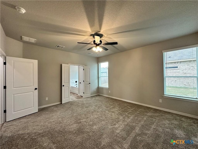 3110 Gryffindor Ln, Killeen, TX 76549 - unfurnished bedroom with carpet flooring, a textured ceiling, baseboards, and ceiling fan