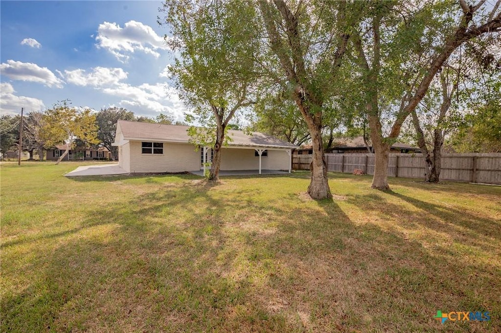 view of yard with a patio area