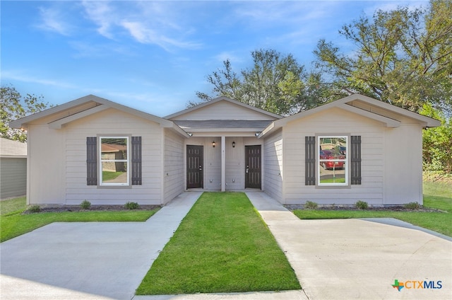 ranch-style house with a front yard