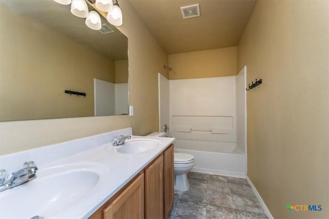 full bathroom with vanity, toilet, and shower / bath combination