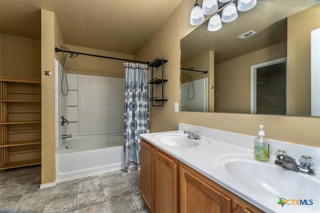 bathroom with vanity and shower / tub combo