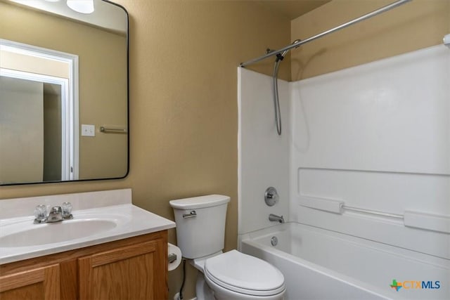 full bathroom featuring vanity, toilet, and shower / bathtub combination