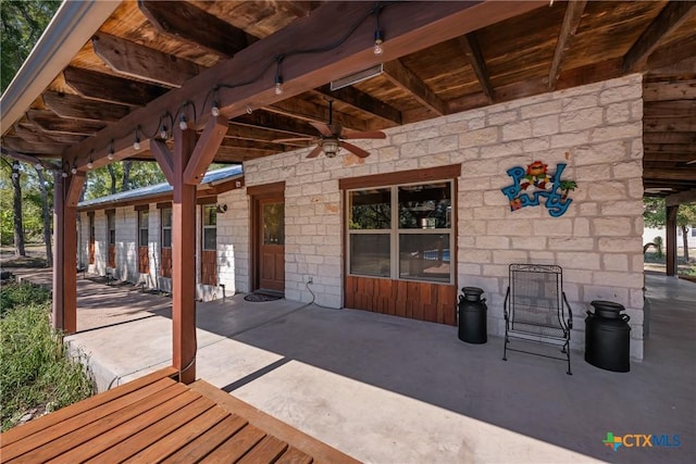 view of patio / terrace featuring ceiling fan