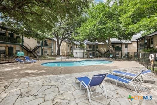 1624 Aquarena Springs Dr Unit G152, San Marcos, TX 78666 - community pool with a patio area