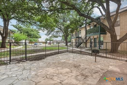 1624 Aquarena Springs Dr Unit G152, San Marcos, TX 78666 - gate featuring stairway