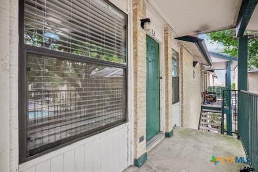 1624 Aquarena Springs Dr Unit G152, San Marcos, TX 78666 - doorway to property with covered porch
