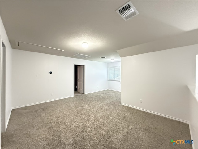 3312 Vineyard Trl, Harker Heights, TX 76548 - unfurnished room with attic access, carpet floors, and a textured ceiling