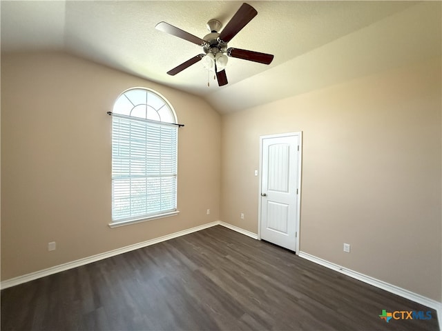 3312 Vineyard Trl, Harker Heights, TX 76548 - unfurnished room featuring lofted ceiling, dark wood-type flooring, and a ceiling fan