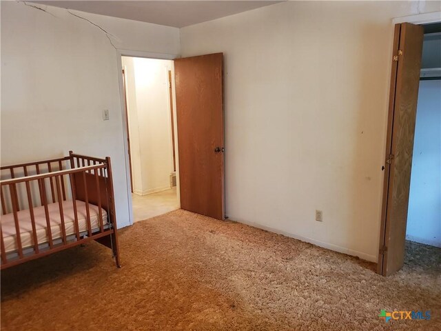 18581 State Highway 53, Temple, TX 76501 - carpeted bedroom with a nursery area