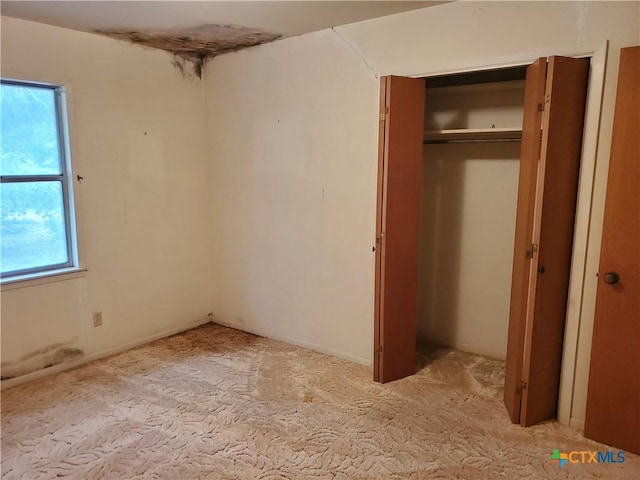 18581 State Highway 53, Temple, TX 76501 - unfurnished bedroom featuring light colored carpet and a closet