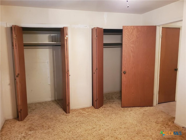 18581 State Highway 53, Temple, TX 76501 - unfurnished bedroom with two closets and carpet