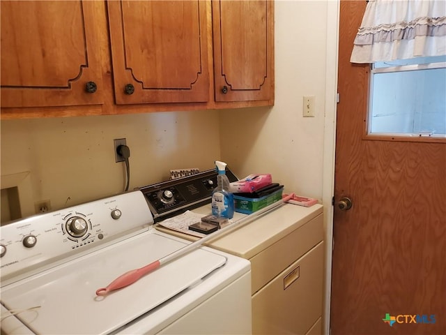 18581 State Highway 53, Temple, TX 76501 - washroom featuring separate washer and dryer and cabinet space