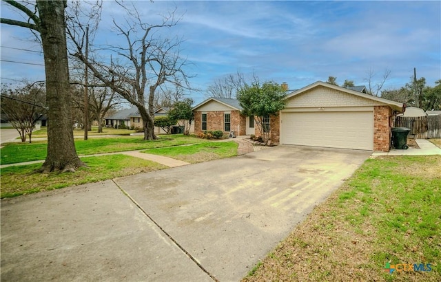 single story home with a garage and a front yard