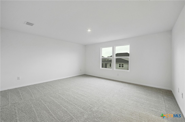 empty room featuring carpet floors